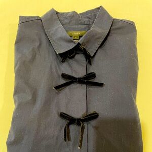 Navy blue button up with black velvet bow detail. Cotton, JCrew, size 6.